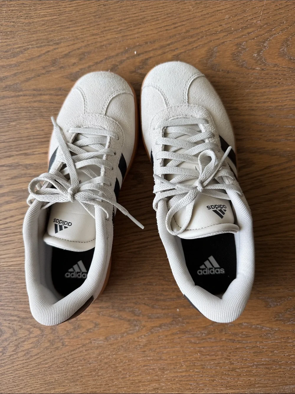 adidas kids (fits women’s size 6.5) Off-White Suede Sneakers with Black Stripes